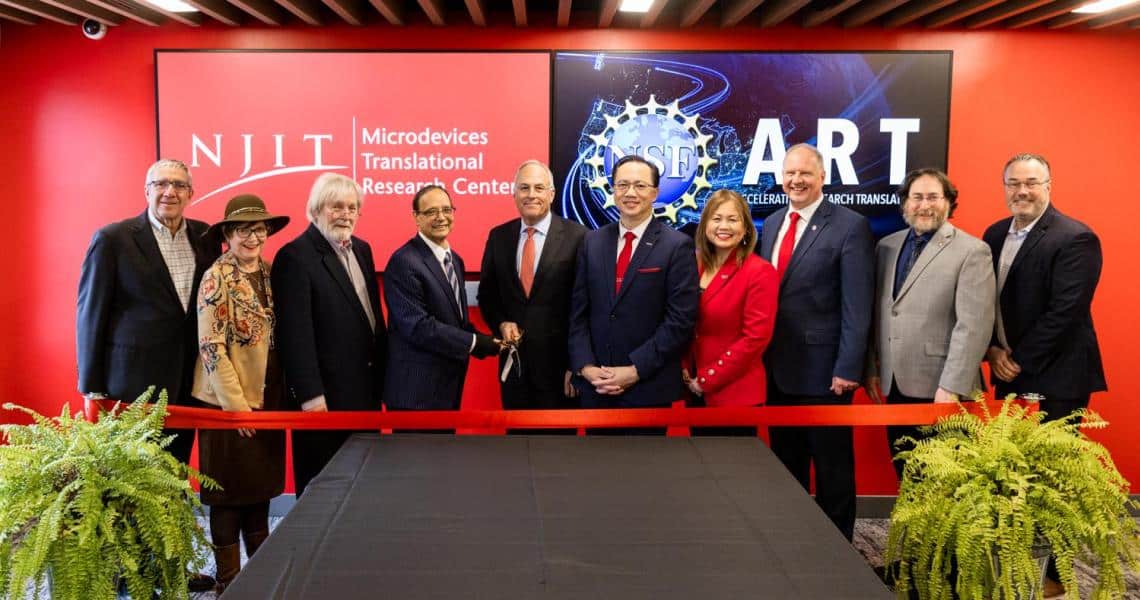 Group of scholars and educators at a science event at NJIT